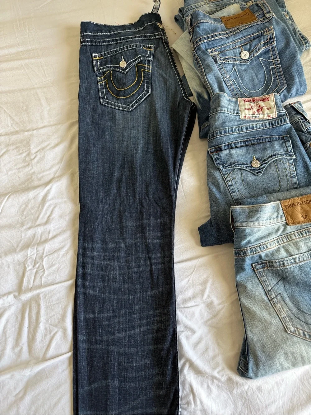 True Religion men’s street cut Jeans in Dark Indigo with Yellow Stitching